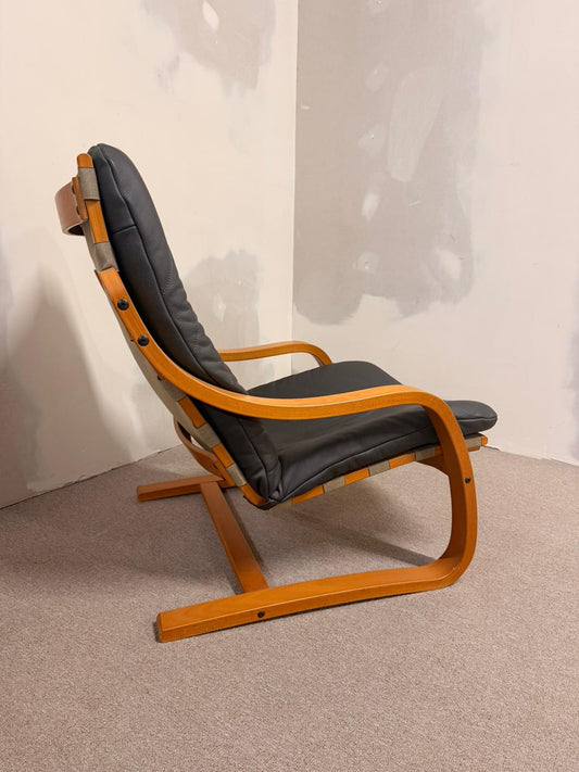 Schwedischer Schwingsessel Relaxsessel aus Leder in Grau