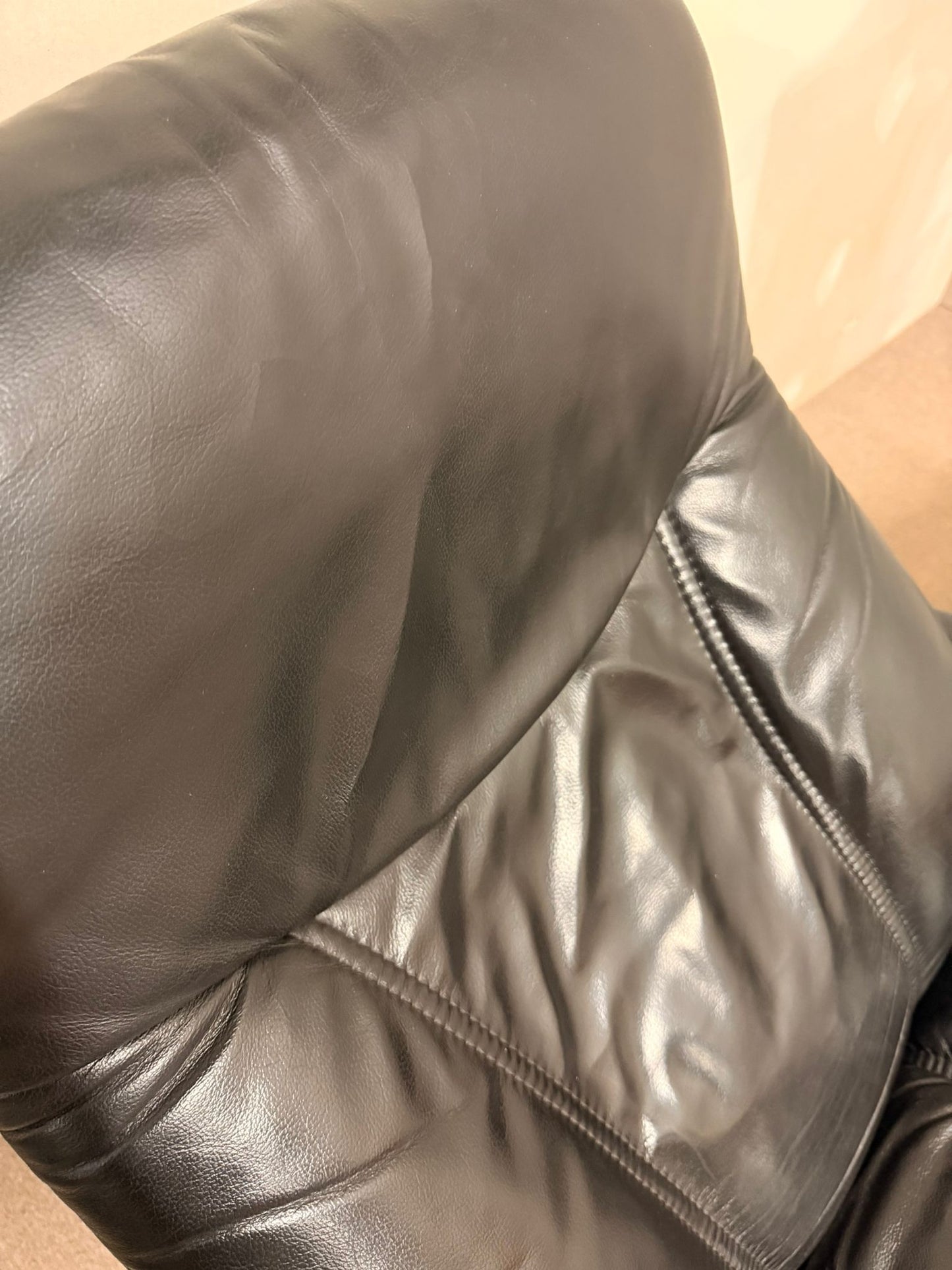 Stressless Consul Relaxsessel mit Hocker aus Leder, schwarz