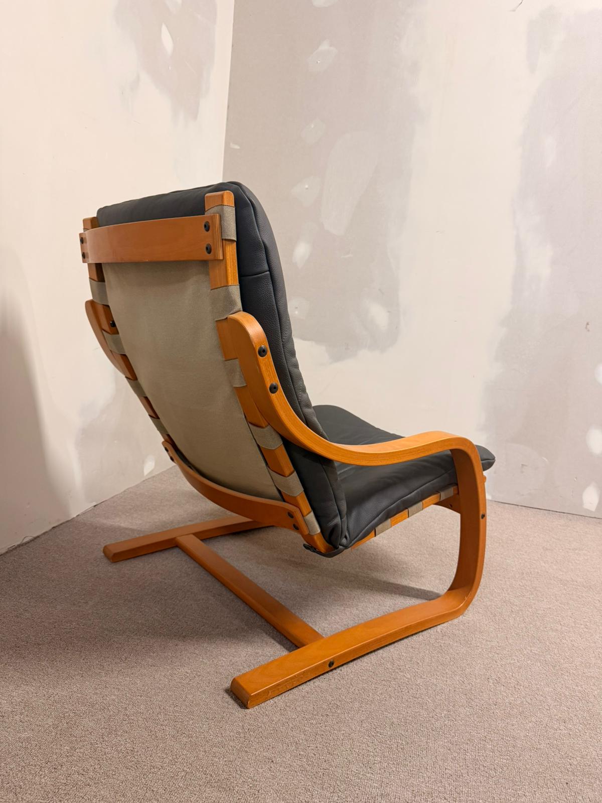 Schwedischer Schwingsessel Relaxsessel aus Leder in Grau